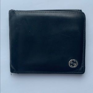 Authentic Gucci black leather wallet.
